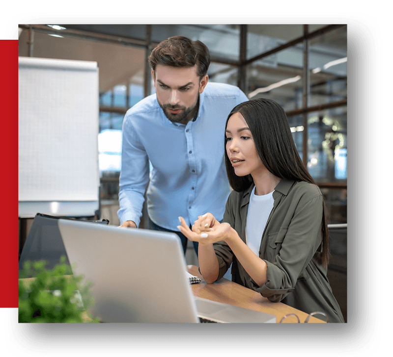 coworkers working on laptop