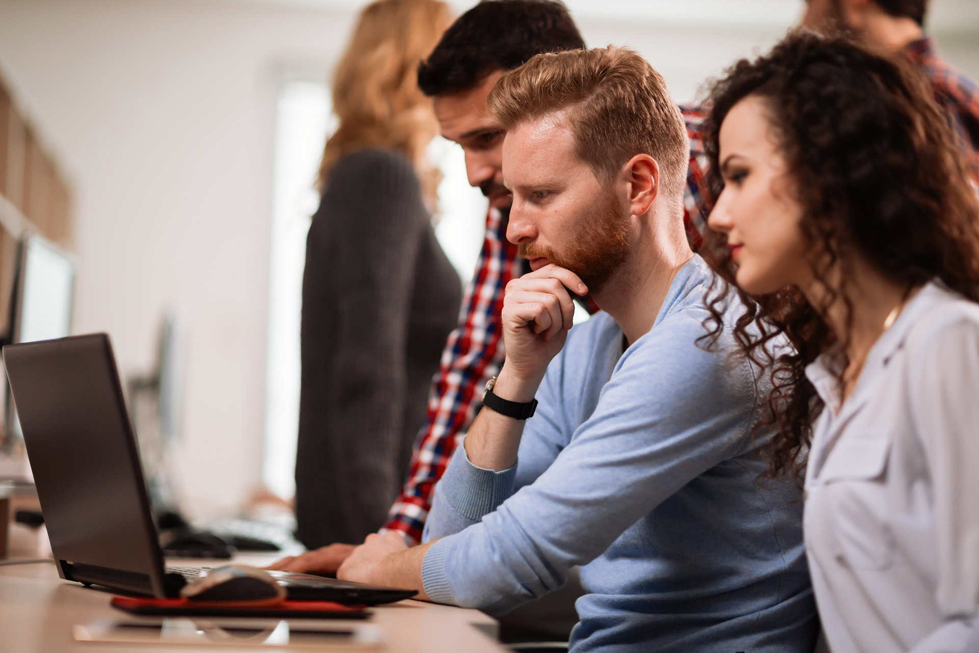 IT team in New Jersey working on a project together