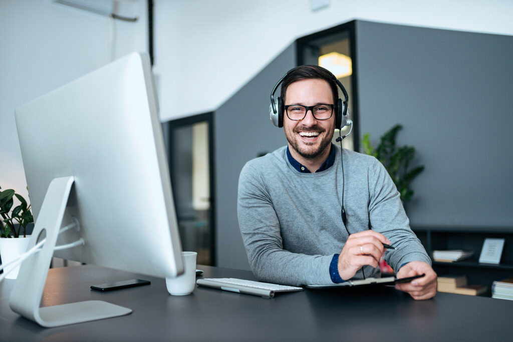 IT consultant smiling in a new jersey office building