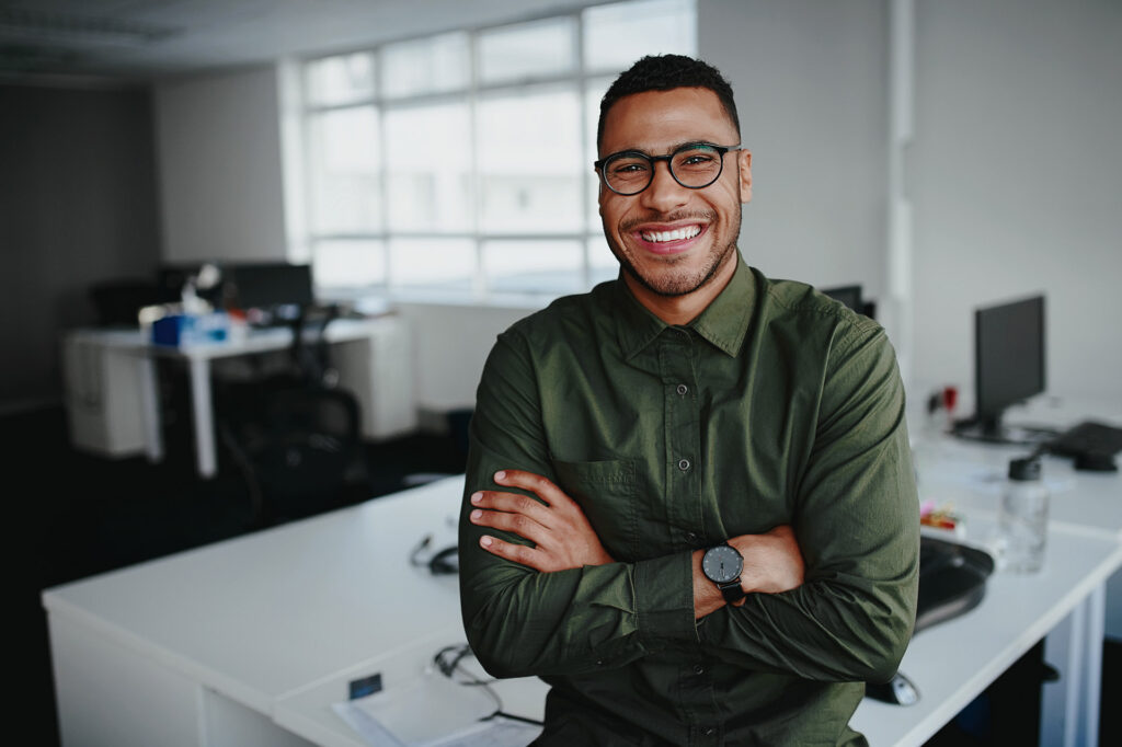 IT consultant smiling and proud of the it services he provided to a new jersey client