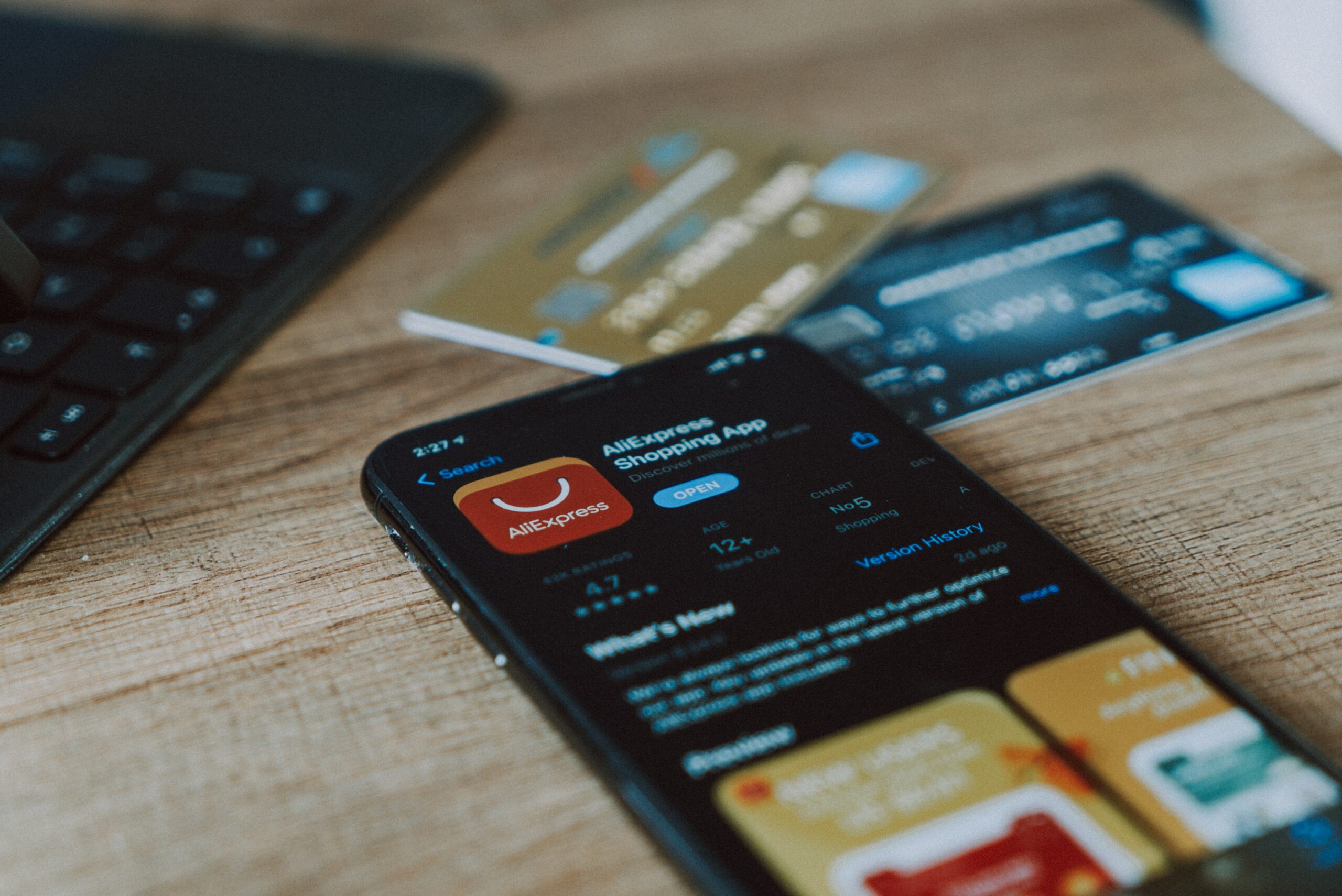 Is Your Online Shopping App Invading Your Privacy? 2 Person using a shopping app on a phone while entering card details