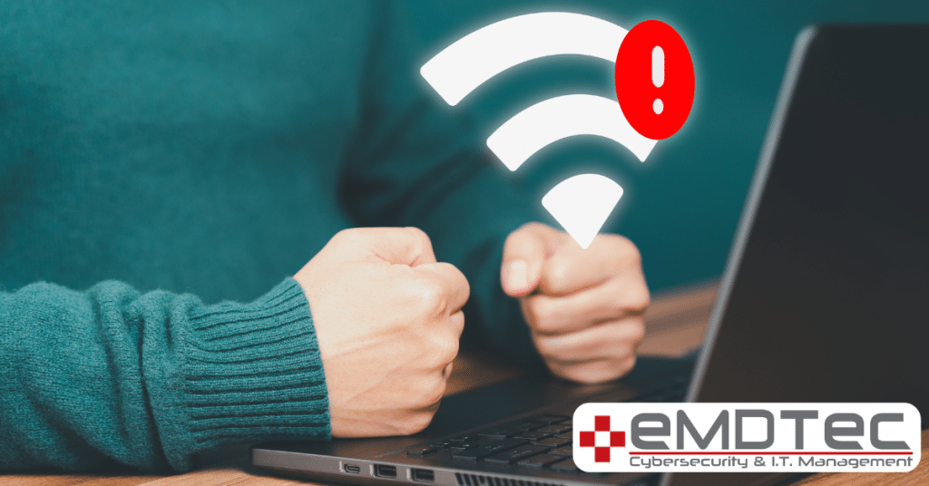 Free WiFi security risks - person using laptop on public WiFi network