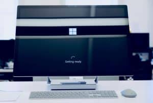 Windows 10 end of support warning on a business computer screen