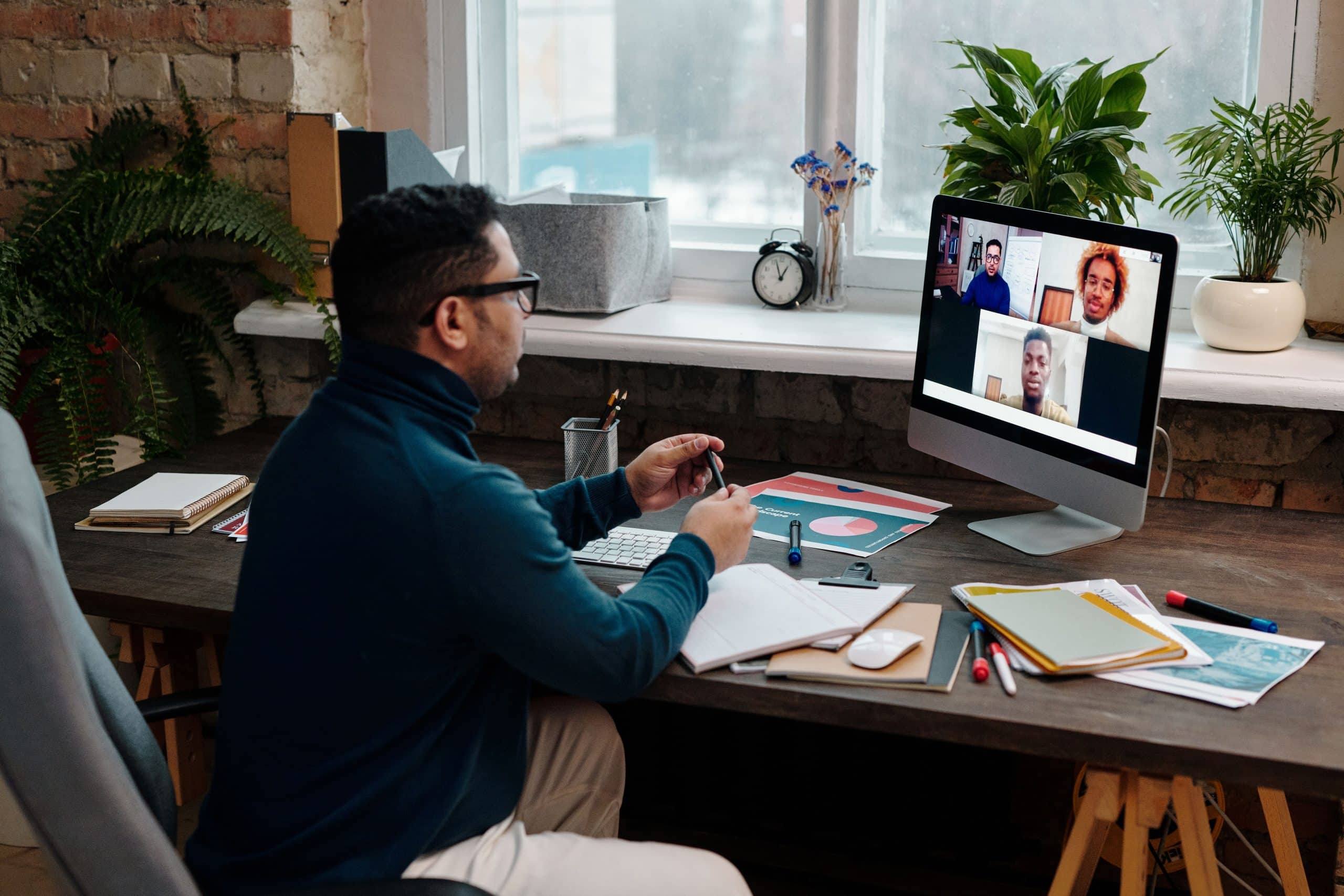 Who Can See What Your AI Note-Taker Records? 2 AI note-taker privacy risks: team on a video call before recording a meeting