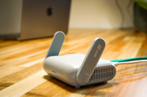 Why Your Guest Wi-Fi Should Be Separate From Your Business Network 1 white wifi router
